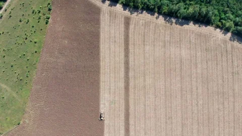 Harvester in work on field 5 Stock Footage 105604088