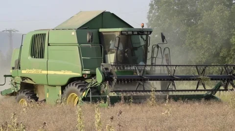 Harvester Working in Field 4 Stock Footage 52123278