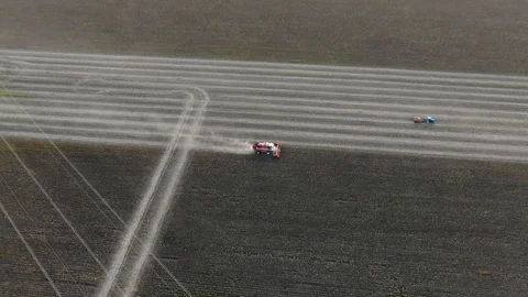 Harvesting machine working in the field. Top view from the drone Combine Stock Footage 115908558