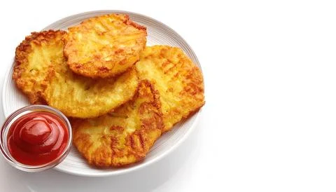 Hash browns, hashed browns or hashbrowns, are a popular American breakfast .. Stock Photos