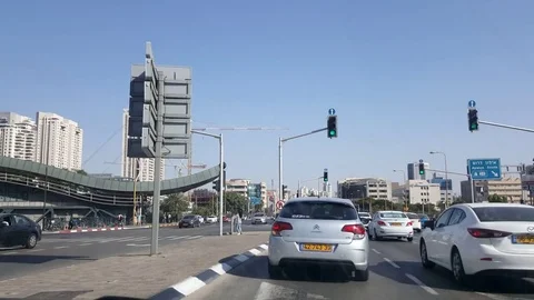 Hashalom Road and train station, shot in motion through windshield of car, sunny Vídeos de archivo 80598279