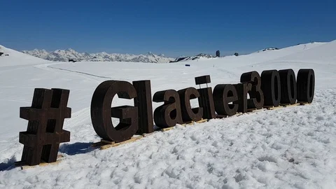 Hashtag constructed from big letters on top of Glacier 3000 in Switzerland Video stock 129538160