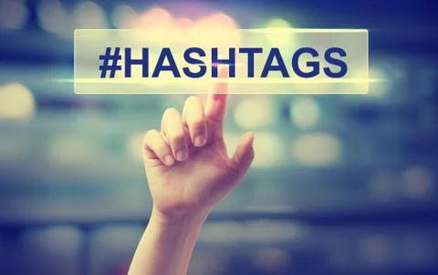Hashtags concept with hand pressing a button Foto stock