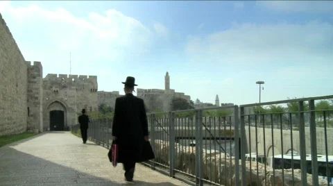 Hasid going into the old city Stock Footage 659608