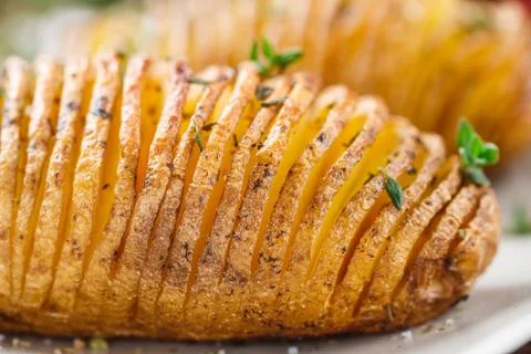 Hasselback potatoes Stock Photos
