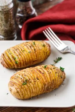 Hasselback potatoes Stock Photos