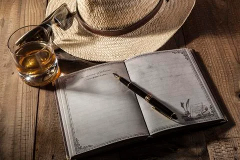 Hat and Notebook Stock Photos
