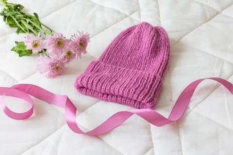 Hat is associated from the white wool veil at near with Pink Ribbon and a sprig Stock Photos