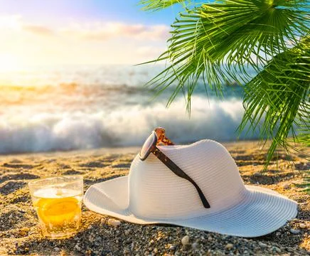 Hat on the beach Stock Photos