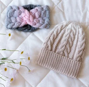 Hat bound manually of different color wool and natural flower Stock Photos