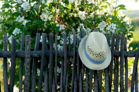 Hat on a fence Photos