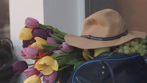 Hat Flowers and Grapes Stock Footage 72386970