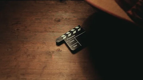 Hat hand clapper board wooden table hd footage Stock Footage 108689206