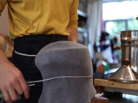 Hat-maker in works Stock Footage 81971747