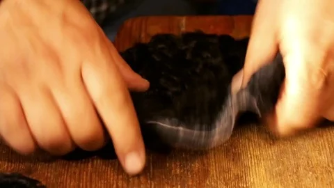 Hat-maker works. Hat making process. Astrakhan hat from original wool and leathe Stock Footage 81477877