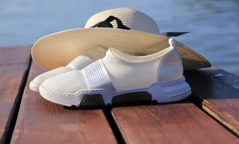 Hat on the pier Stock Photos