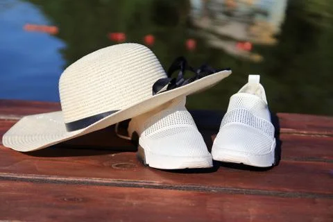 Hat on the pier Stock Photos