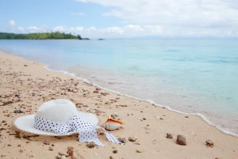 Hat on the sandy beach. Stock Photos