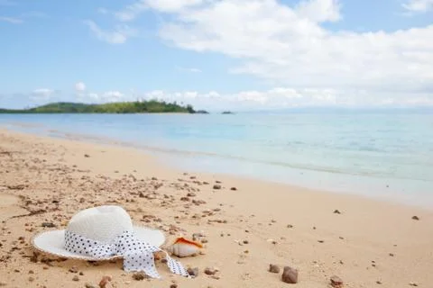 Hat on the sandy beach. Stock Photos