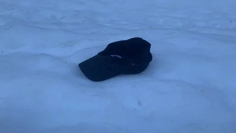 Hat on the snow Stock Footage