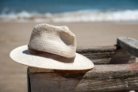 Hat on table at beach Stock Photos