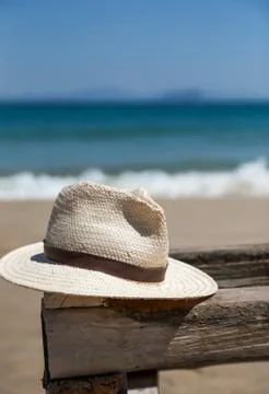 Hat on table at beach Stock Photos