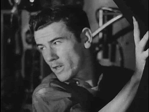 A hatch opens in the deck of the Coast Guard cutter Mendota, a seaman emerges, Stock Footage 75288322
