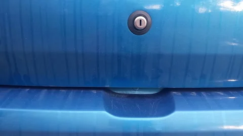 Hatchback Tailgate Slam with Heavy Thud and Lock Mechanism Clunk -- Close-up on  Stock Footage 322576504