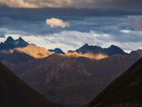 Hatcher pass mountain cloud and light patches Stock Footage 80321580