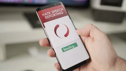 Hate Speech Reporting on a Mobile Smart Phone App Stock Footage 166240177