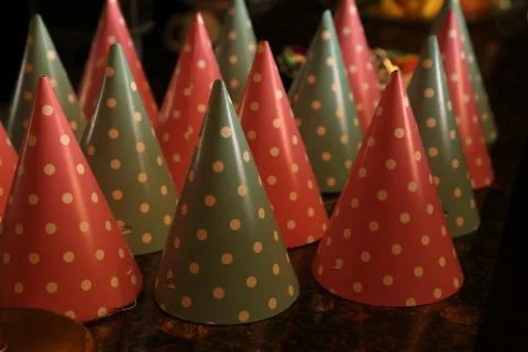 Hats for party on ceramic table. Close up Stock Photos