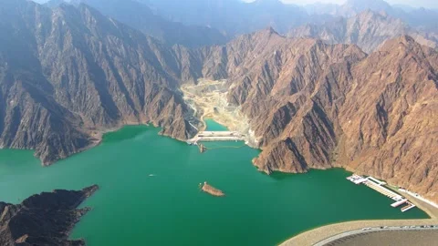 Hatta Dam Lake in eastern region of Dubai, United Arab Emirates aerial view 스톡 동영상 145344161