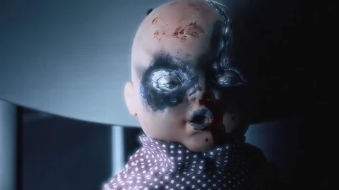 Haunted doll rocking talking glow detail Stock Video Pond5