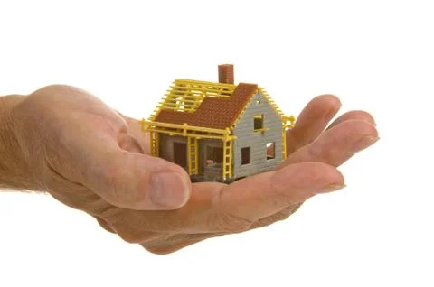 Haus in hand Stock Photos