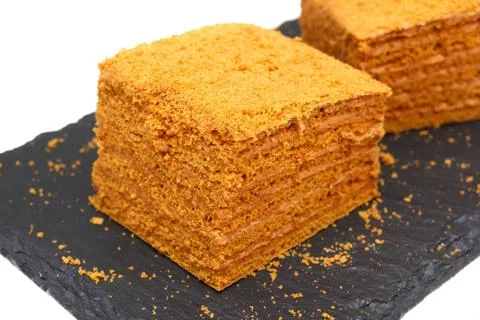 Hausgemachter geschichteter süßer Kuchen mit Honig und Sahne. Gebackenes S. Stock Photos