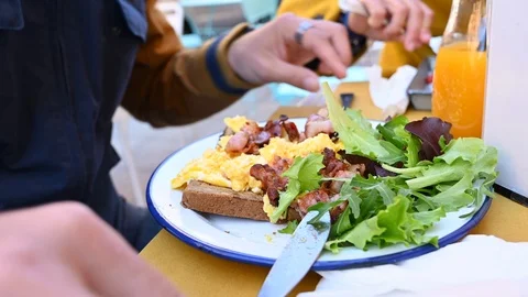 Have breakfast after the hangover Stock Footage 105476643