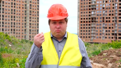 Have a money concept. Builder making cash sign gesture rubbing fingers together Stock-Footage 111875134