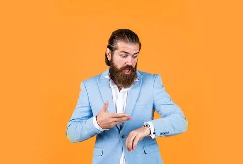 Have no time. old fashioned bearded hipster watching time on luxury clock. time Stock Photos
