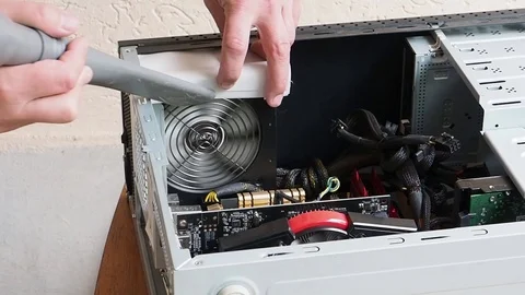 Having blown the dust vacuum cleaner in the system unit. Stock Footage 105496248