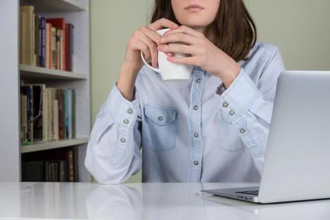 Having a break from work at computer at home Stock Photos