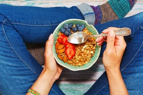 Having breakfast sitting on the floor Stock Photos