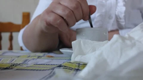 Having a cup of coffee after a meal at home Stock Footage 290982228