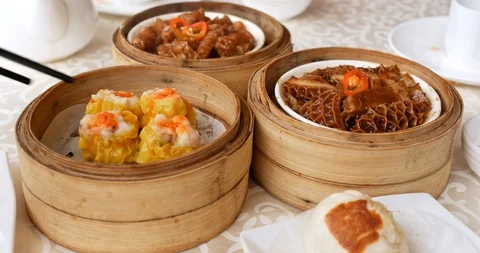 Having dim sum in chinese restaurant Stock Footage 85733221
