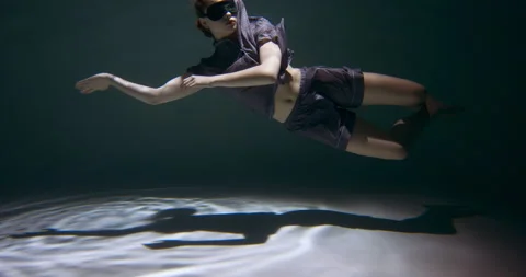 Having a dream sleeping. Young attractive woman in pyjamas, sleep mask sinking Video stock 154182801