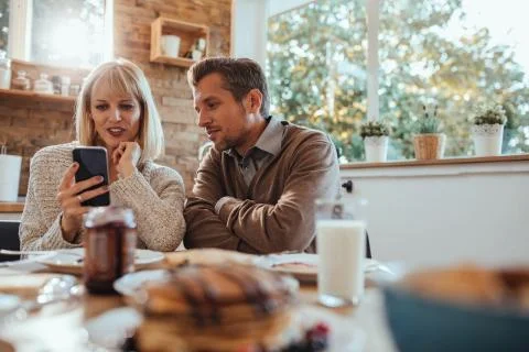 Having fun at a breakfast table Stock Photos