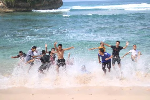 Having Fun With Friends in Beach Stock Photos
