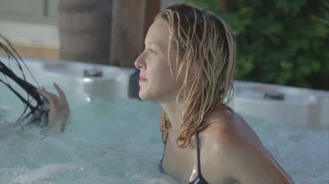 Having fun in the jacuzzi Video stock 41551903