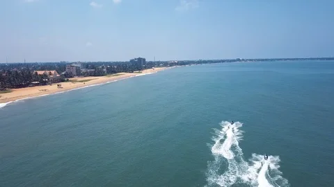 Having fun on jetskis in the ocean in Negombo Stock Footage 105604206