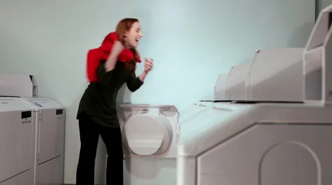 Having Fun at launderette 動画素材 1105534