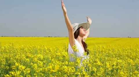 Having fun in a rapeseed Stock Footage 24671621